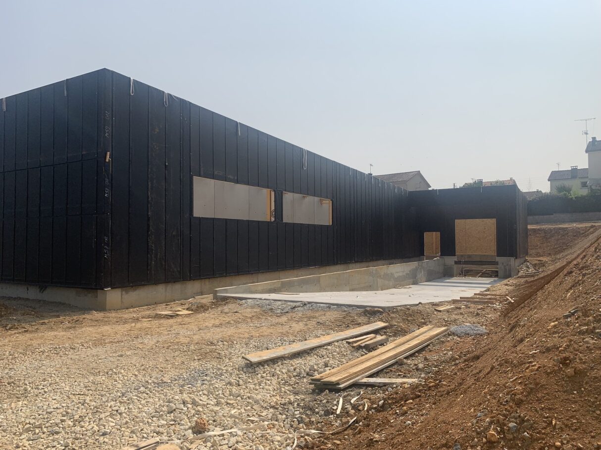 Fabrication et pose des murs à ossature bois - chantier magasin aldi coulounieix