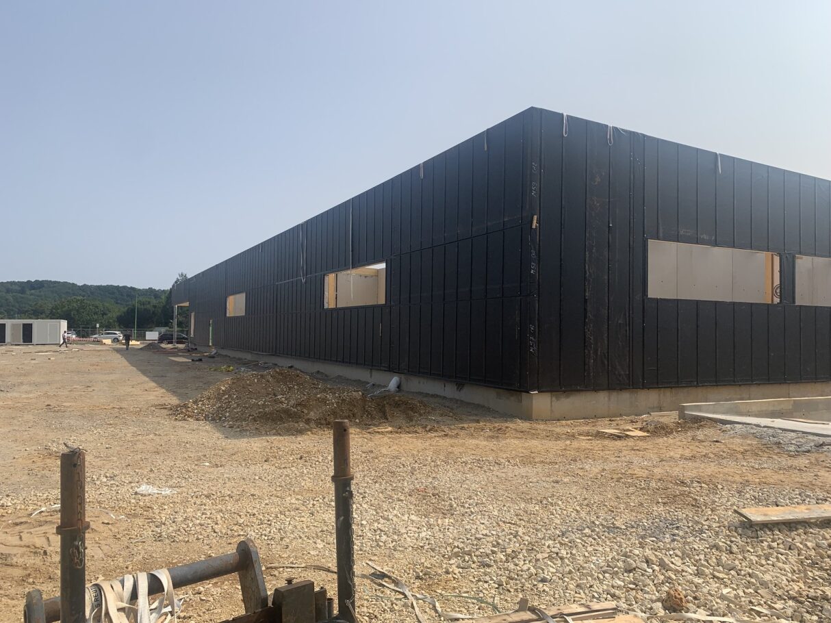 Fabrication et pose des murs à ossature bois - chantier magasin aldi coulounieix